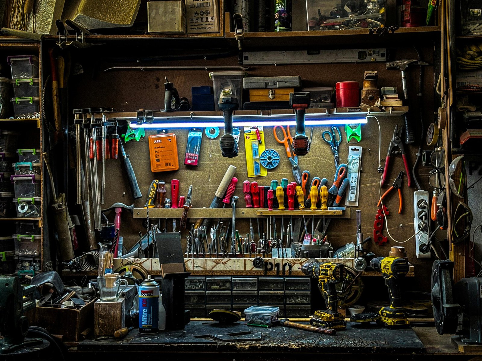 Neatly arranged carpenter tools on a workshop bench in Istanbul, Turkey.